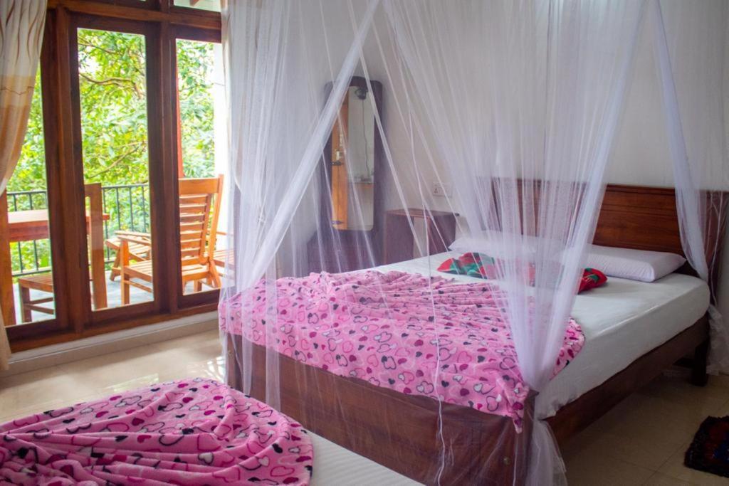Amado Homestay Ella Bagian luar foto