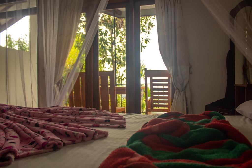 Amado Homestay Ella Bagian luar foto