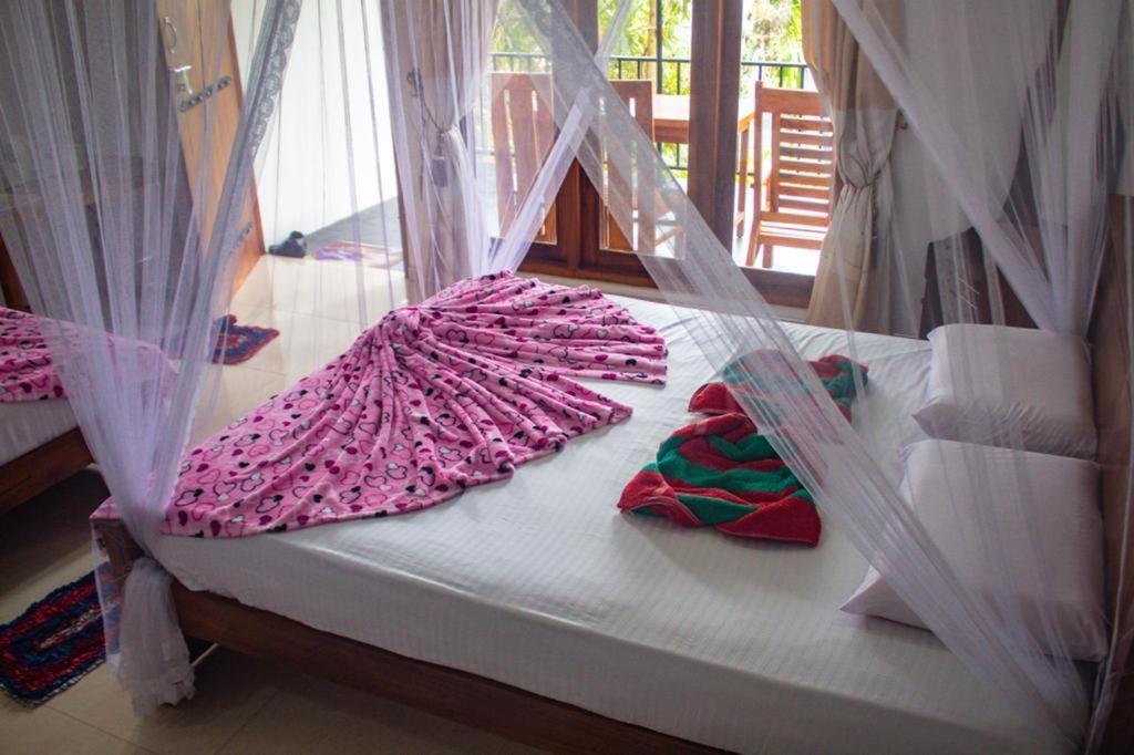 Amado Homestay Ella Bagian luar foto